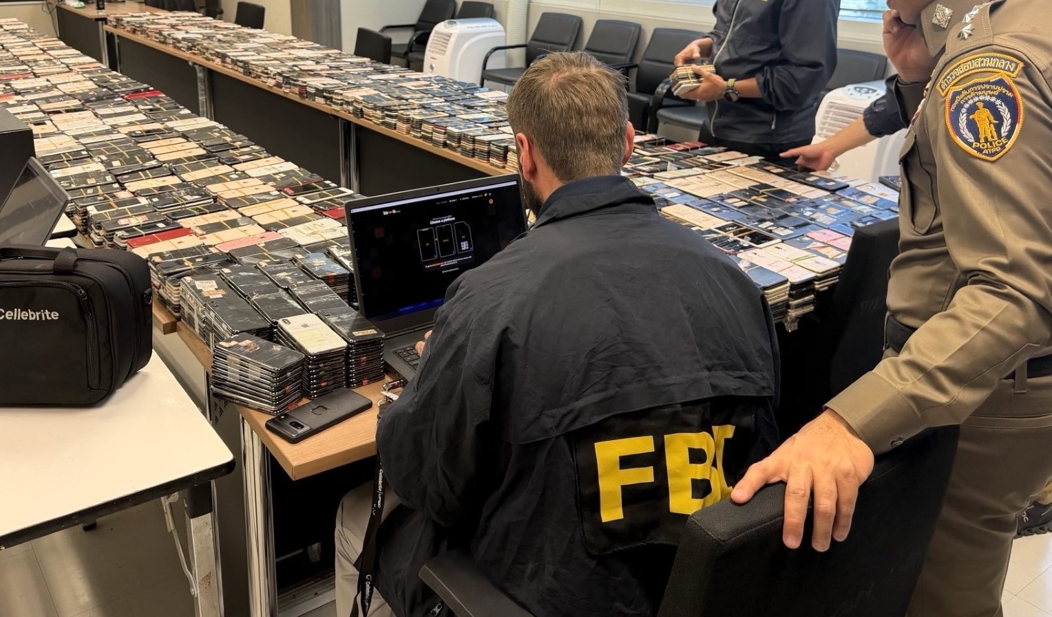Can Police Track Your Phone? How Phone Location Tracking Actually Works 1 FBI personnel and Thai police reviewing digital evidence