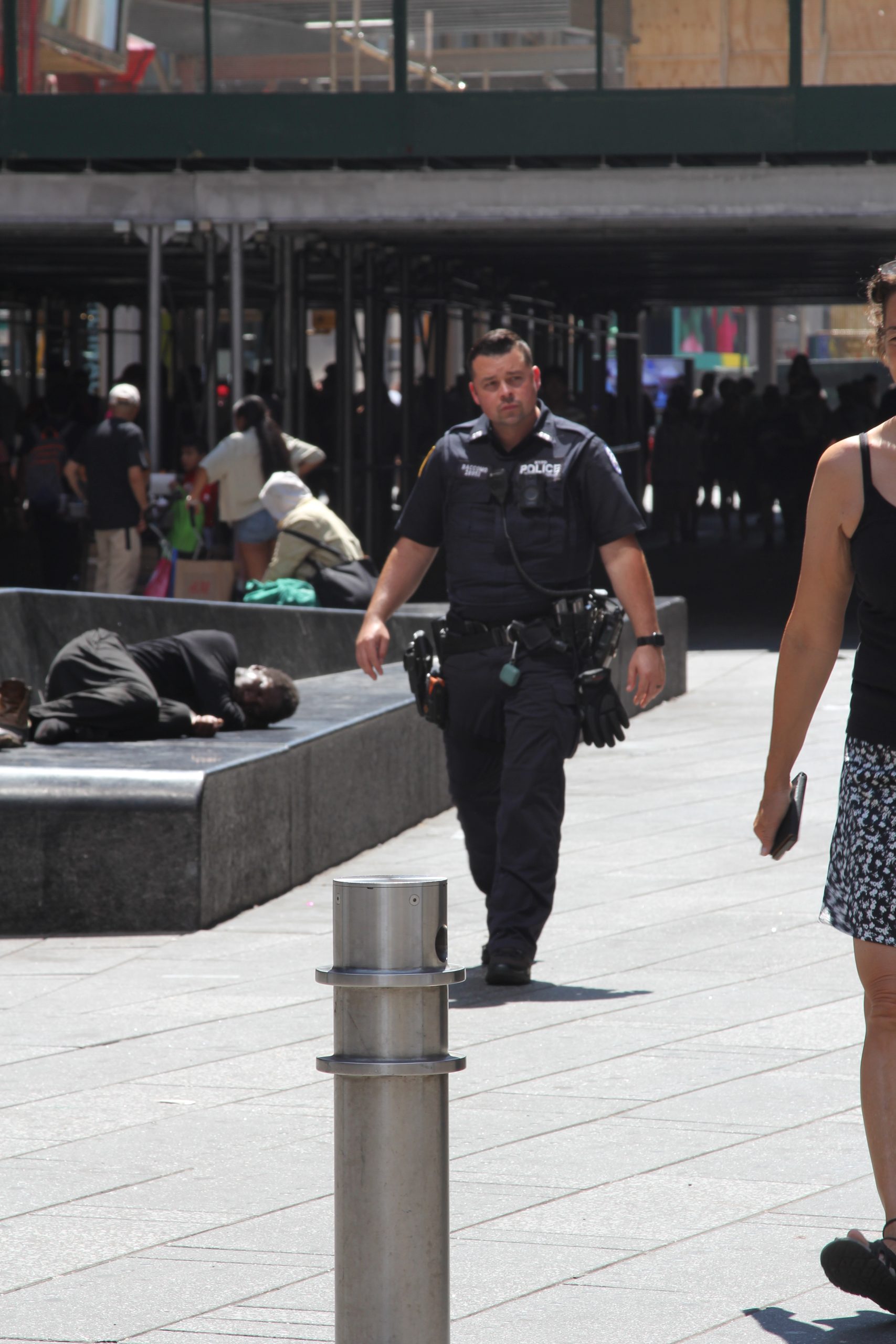Can Police Officers Have Tattoos? Department Rules Explained 1 Uniformed NYPD officer wearing a short-sleeve patrol uniform in New York City