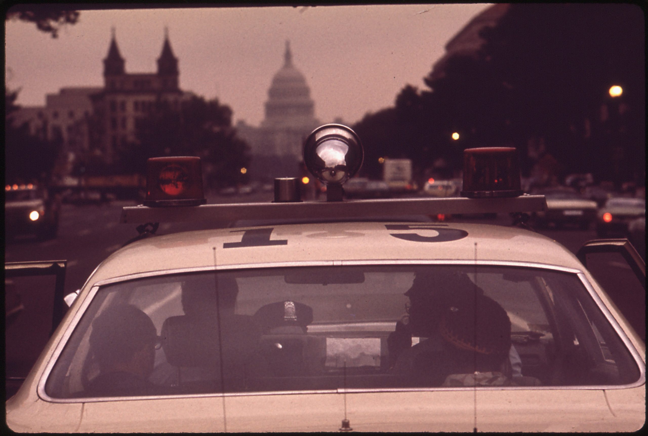 What Is a Police Citation? Tickets, Summonses and What Happens Next 2 Police officers writing a report after a traffic accident in Washington DC