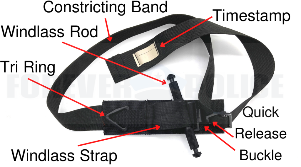 SOFTT-W tourniquet parts showing the windlass rod, strap, tri-ring, buckle, constricting band and time tab