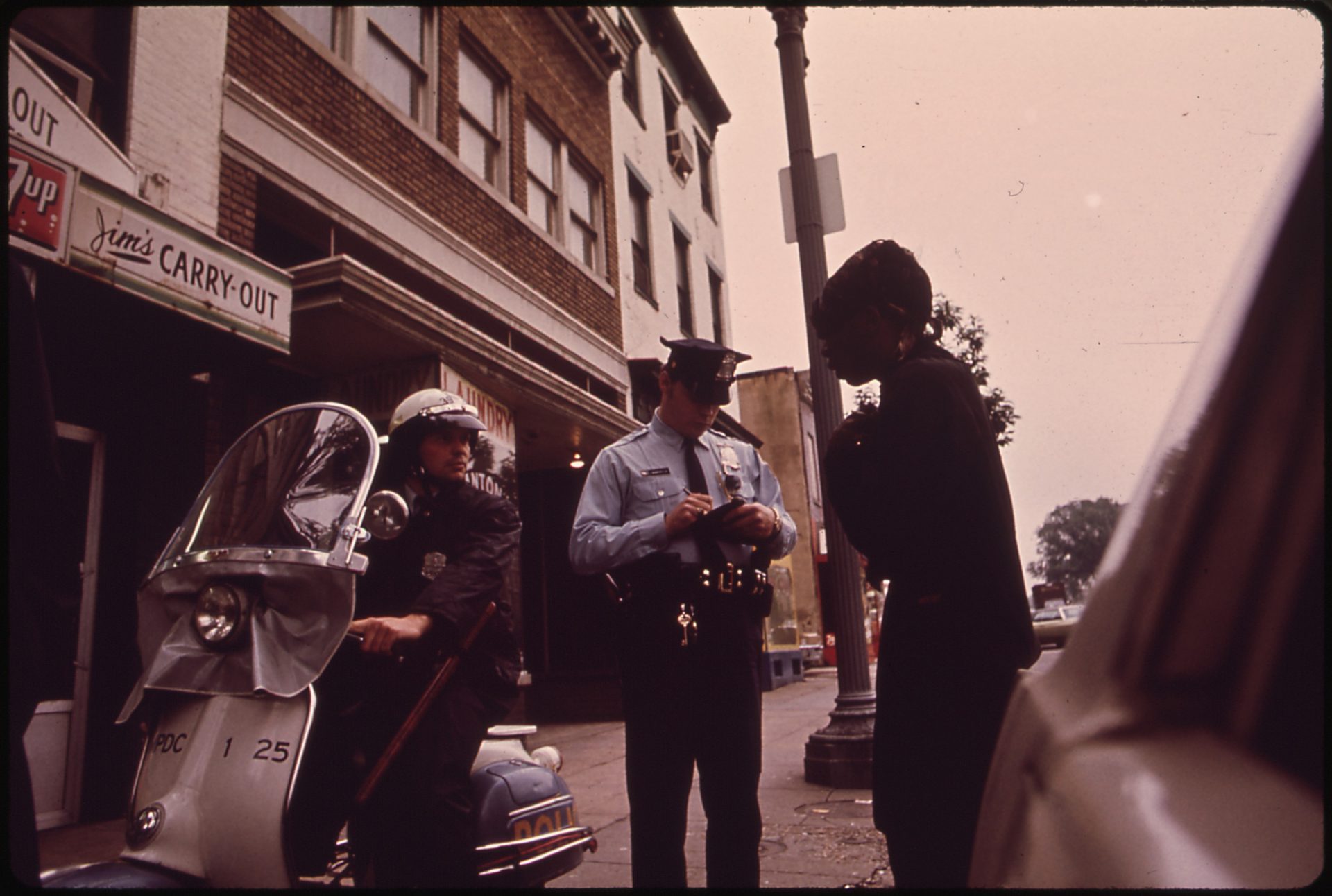Washington DC police officer writing a report